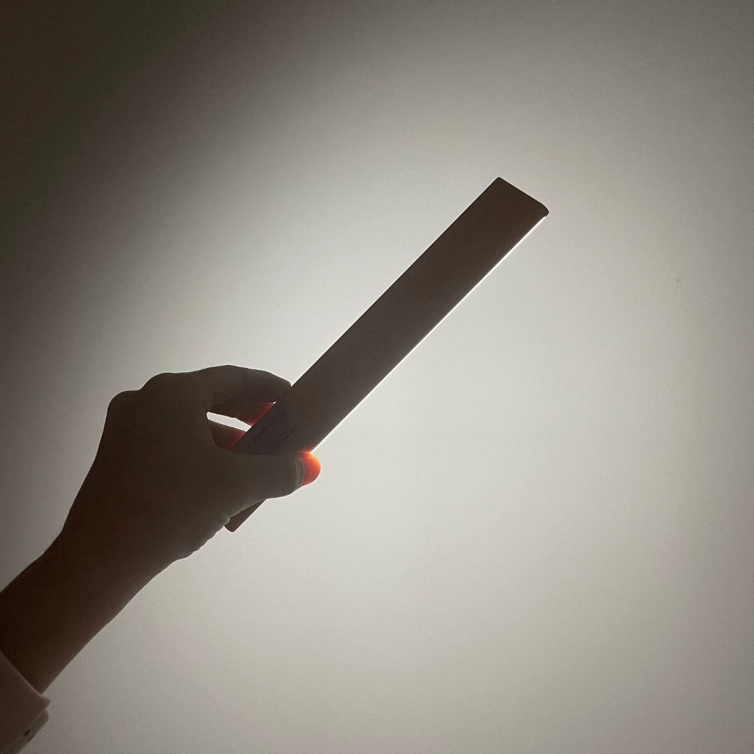 Magnetic strip light with motion sensor and rechargeable design