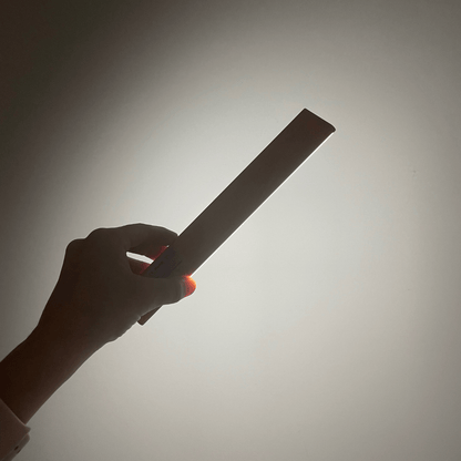 Magnetic strip light with motion sensor and rechargeable design